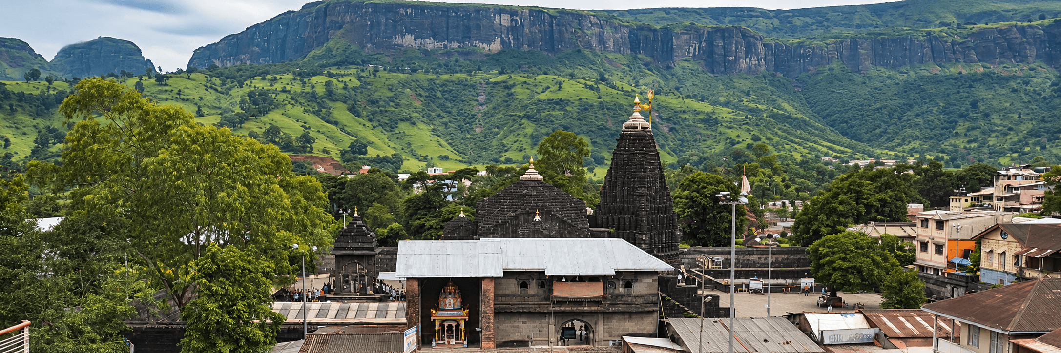Trimbakeshwar Temple beneath the cliffs of the Brahmagiri range